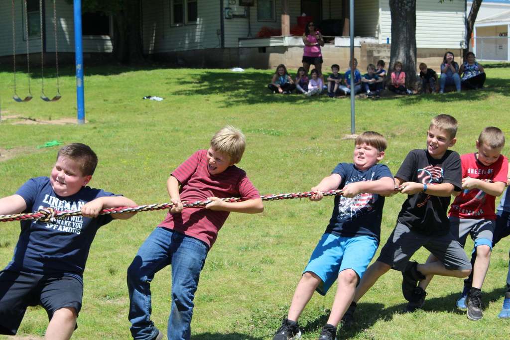 kids tugging on a rope