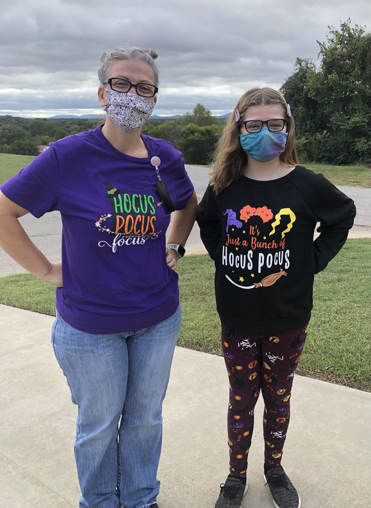 teacher and student with Hocus Pocus shirts on