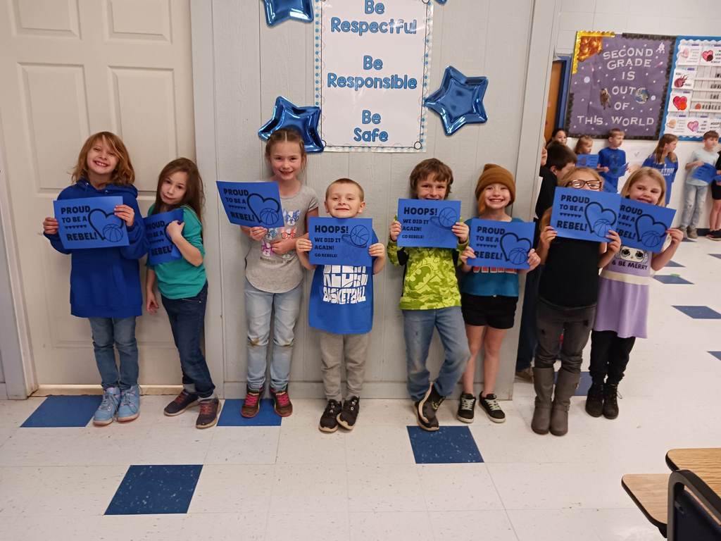 kids holding signs